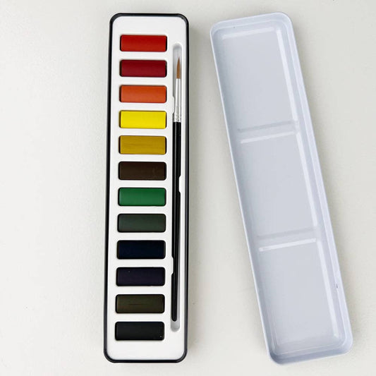 Watercolor paint with brush